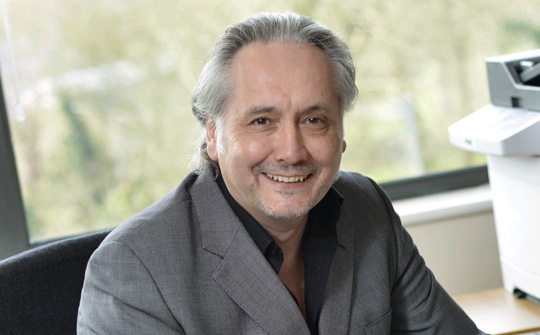 Tom Gittins CEO Pebble Beach Systems